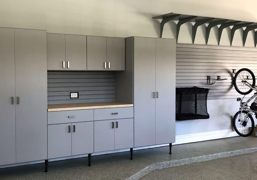 custom garage storage system with bike rack and storage closet